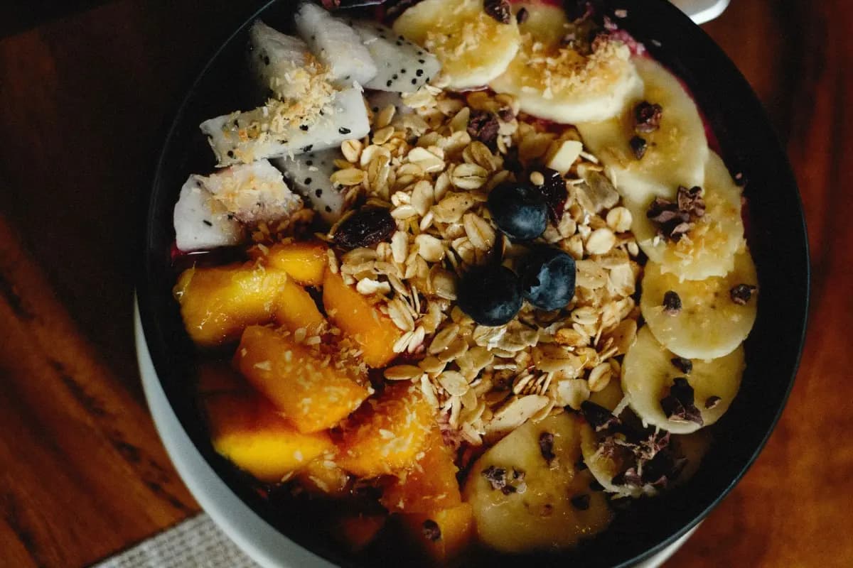 Fresh fruit and granola bowl, a gluten free breakfast option found at restaurants across Bali.
